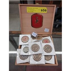 Old wooden tokens & nickels in cigar box