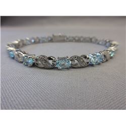 Blue Topaz & Diamond tennis bracelet