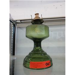 Vintage green glass oil lamp