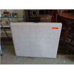 Used 6' resin table - folding legs
