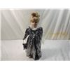 Image 1 : 17" PORCELAIN DOLL METALLIC SILVER DRESS