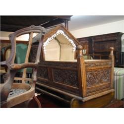 Continental oak lace lined carved crib…