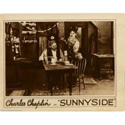 Sunnyside (First National, 1919). Lobby Card (11" X 14"). Chaplin made his third million dollar come