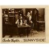 Image 1 : Sunnyside (First National, 1919). Lobby Card (11" X 14"). Chaplin made his third million dollar come