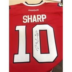 Autographed Patrick Sharp Chicago Blackhawk's Jersey with certificate of aunthentication. Donated by