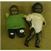 Image 1 : Two black dolls. £20-30...