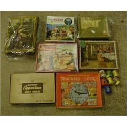 Jigsaws including 1960's Noddy example etc. £40-60...