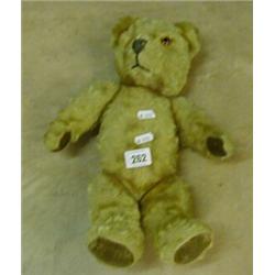 Teddy bear with growler. £20-30...