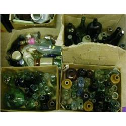 Four boxes of collector's bottles including grape storage bottle. £25-35...