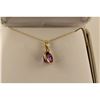 Image 1 : ONE 14KT YELLOW GOLD NATURAL PURPLE SAPPHIRE AND DIAMOND SET PENDANT. SET WITH ONE OVAL MIXED CUT