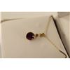 Image 2 : ONE 14KT YELLOW GOLD NATURAL PURPLE SAPPHIRE AND DIAMOND SET PENDANT. SET WITH ONE OVAL MIXED CUT