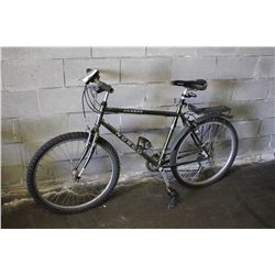 2 BIKES, BLACK FREE SPIRIT AND GREEN NORCO