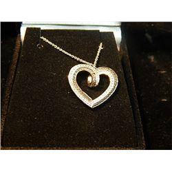 NECKLACE - HEART PENDANT WITH BLACK AND WHITE DIAMONDS SET IN JEWELERY'S BRASS WITH RHODIUM PLATING 
