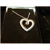 Image 1 : NECKLACE - HEART PENDANT WITH BLACK AND WHITE DIAMONDS SET IN JEWELERY'S BRASS WITH RHODIUM PLATING 