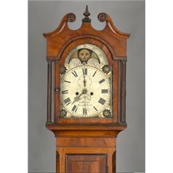 Early 19th Century mahogany longcase clock, the hood having swan neck pediment and reeded pillars...