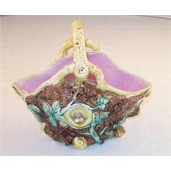 19th Century majolica basket shaped bowl with rustic design handle, the body moulded with birds n...