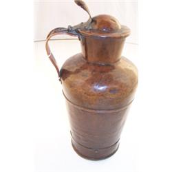 Arts & Crafts style copper tapered cylindrical jug with scroll handle and domed cover having thum...
