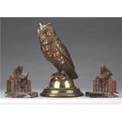 Late 19th Century copper finish spelter inkwell formed as an owl perched on a gilt metal domed ba...