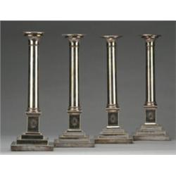 Set of four 19th Century Sheffield plate column candlesticks on three tiered stepped bases, 31cm...