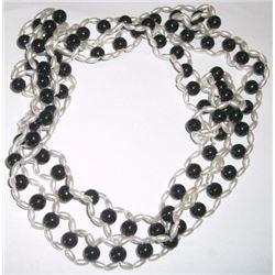 Long beaded pearl white and black necklace
