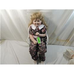 PORCELAIN SITTING DOLL