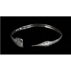Tlingit Silver Bracelet with Carved and Incised Bird Form 8 1/4" L.  Good Condition with Two Minor C