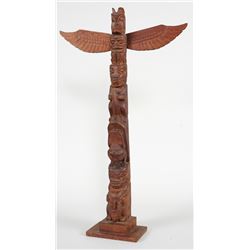 Northwest Coast Totem Carved with Thunderbird, Bear, Raven, Frog and Bear Holding a Wasco 28" H. 17"