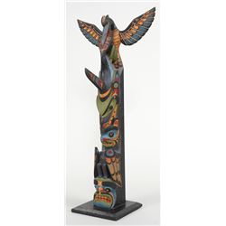 Walkus Totem Carved with Oyster Catcher Holding a Killer Whale  Biting a Hawkman Standing on a Chief