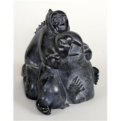 Inuit Soapstone Carving of a Hunter and Walrus '73 Signed in Syllabic 8 1/2" H. 8" Deep  Good Condit