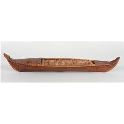 Kutenay Model Birch Bark Canoe with Split Birch Frame ca. 1910 24 1/2" L. 5" W. 2" H.  Fair Conditio