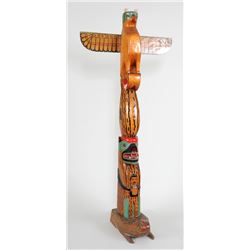 Nuu-chah-nulth Totem Carved with Thunderbird and Bear Holding a Human on a Frog Base ca. 1950's 52" 