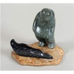 Inuit Carving of an Inuk and Seal by Isaac Sala - Sanikiluaq 6" H. 6" W.  Good Condition