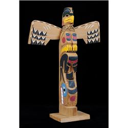 Northwest Coast Hesquiaht Totem Carved with Eagle and Killer Whale Signed Nick 23 1/2" H. 17" W.  Go