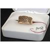 Image 1 : LADIES 10K YELLOW GOLD DIAMOND CLUSTER RING CONTAINS 57 ROUND DIAMONDS, FANCY CHOCOLATE COLOR. APPRO