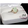 Image 1 : LADIES 14K WHITE GOLD RING WITH 1 OVAL SHAPED OPAL, MEASURING 12X10MM, 6 DIAMONDS. THE REPLACEMENT C