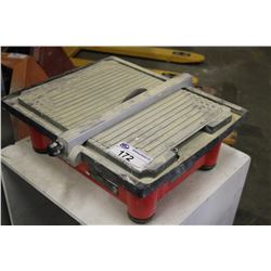 HUSKY TILE SAW ON MOBILE TABLE WITH CONTENTS