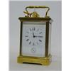 Image 1 : A BRASS CARRIAGE CLOCK, 20th Century, Roman dial, signed 'Mathew Norman, London, 1750', coil stri...