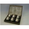 Image 1 : A CASED SET OF SIX DEMITASSES, relief silver sleeves with country scenes, maker RB, Sheffield 191...