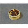 Image 1 : A CIRCULAR IVORY LIDDED BOX, George III period, inset tortoiseshell disk, diameter 5.5cm 50-60...