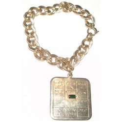 Sarah Cou. calendar necklace