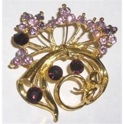 Vintage rhinestone purple and black pin