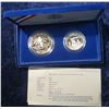 Image 2 : 54. 1986 S Statue of Liberty Two-Piece Proof Set with Silver Dollar and Half-Dollar.