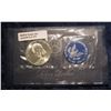 Image 1 : 179. 1972 S Eisenhower Uncirculated Silver Dollar in original cellophane and blue envelope with lite