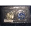 Image 2 : 179. 1972 S Eisenhower Uncirculated Silver Dollar in original cellophane and blue envelope with lite