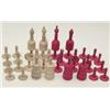 Image 1 : A mid 19th century English bone barley-corn chess set, red stained and natural sectional form wit...