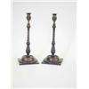 Image 1 : A pair of George III style gilt metal and mahogany candlesticks, each with fluted vase shaped noz...