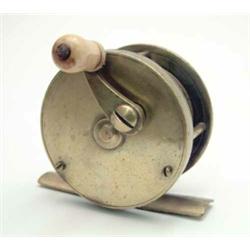 A late 19th century brass multiplying reel, of 'Blacker' type with carved crank arm, ivory knop a...