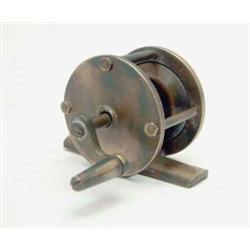 A late 19th century Hardy brass multiplying reel, with curved crank arm and brass knop, stamped,...