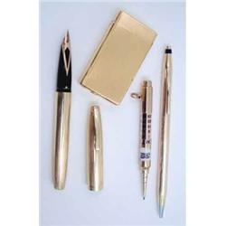 A Mordan drop action pencil with calendar and three other items (4)...