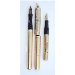 A 9ct gold Waterman ladies pen (gothic pattern) and a rolled gold Swan (2)...